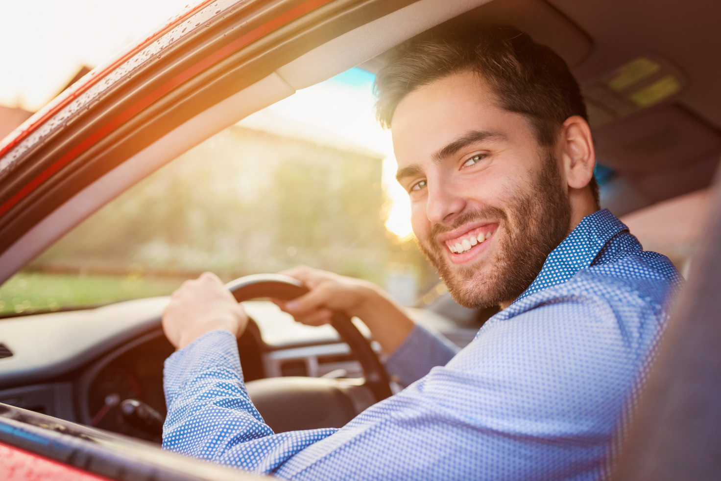 Man Driving a Car